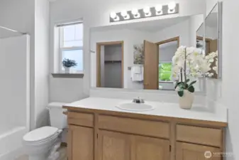 Primary En-Suite Bathroom with Walk in Closet
