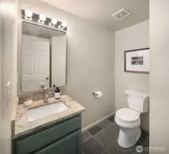 Powder room off the living area on the main level.