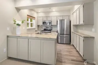 The current owners have updated the kitchen with designer touches.