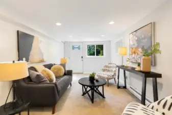 Lower level with separate entrance offers the  possibility for short term rental income RIGHT  NOW, easy upside potential as a full ADU, or  retain for a secondary rec room/home  theater + private bedroom.