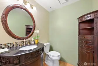 Enjoy the stylish, updated Powder Bath conveniently located on the Main Floor.