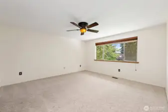 The Primary Suite is spacious, and light & bright....