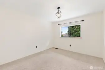 4th bedroom overlooking private backyard.