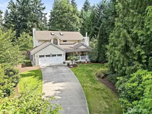 Ariel view of spacious front landscaped yard, with house set back offers maximum privacy.