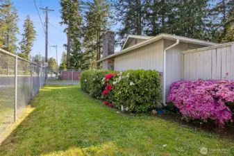 Front of home with mature landscaping