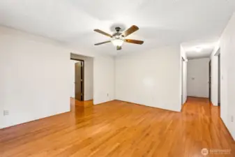 Family room off back of home. Hall leads to dining room and front door