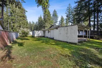 Side of home with privacy walls