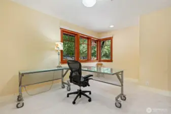 Two bedrooms with the same layout. This one is shown as an office.