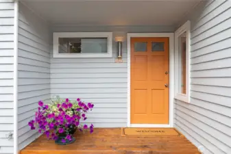 A gracious covered front porch welcomes you home and greets your guests. The exterior of the home was recently painted.