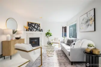 A south facing wall of windows and gas fireplace are great features in this room.