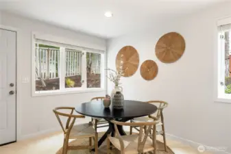 The dining area next to the kitchen also connects directly out to the back yard.