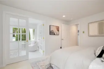 This bedroom space is connected by French doors to a private den/office/nursery.