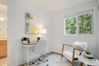 Heading upstairs to the second living space. Just off the stairs is a loft area that would make a great homework area, TV room or home office.