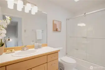 The upstairs full bathroom with a tub/shower combo.