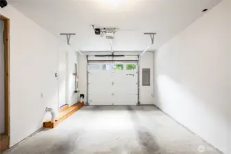 The attached one-car garage has an automatic garage door opener and a nice bonus storage area too.
