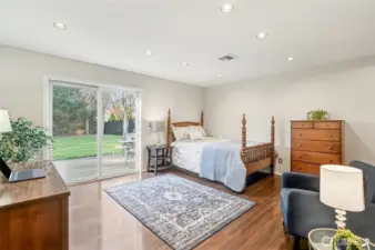 MAIN floor Primary Suite with a walk-out patio & fully-fenced yard.