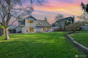 A shy 1/4 lot with a large level yard makes this the perfect area for lawn sports.