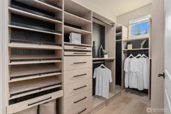 Now that's a stunning custom-built walk-in closet!