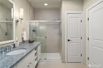 Dual vanity spa-esque upper floor 3/4 bathroom.