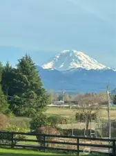 The view of majestic Mount Rainier and the Cascade foothills from the living room window.