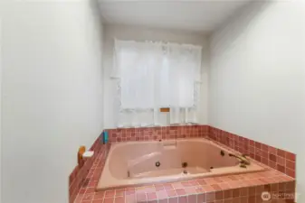 Jetted soaking tub.
