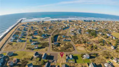 Affordable Ownership in Ocean Shores! Here's your 7700 sq ft Flat & Cleared Lot w/Water, Power, Sewer out front!