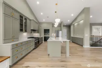 High end appliances with 7 burner propane stove &  2 ovens.