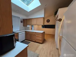 Kitchen has skylight.