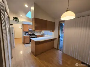 Another eating area off kitchen with sliding door to a spacious deck. Nice large pantry.