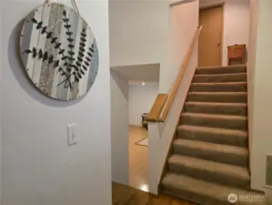 Stairs to upstairs bedrooms for quiet privacy.