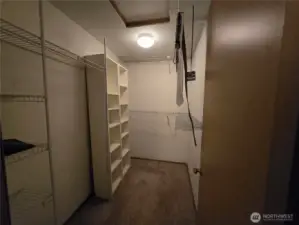 Large walk in closet in primary bdroom.
