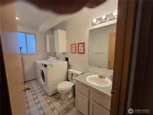Laundry room and half bath.