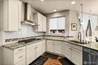 Granite counters and plenty of prep space