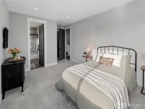 Downstairs bedroom includes walk-in closet & full bathroom.