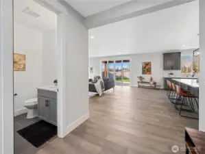 Guest 1/2 bathroom adjacent to living room.