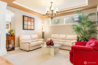 Formal dining room or as the seller has used the space as a cozy conversation corner.