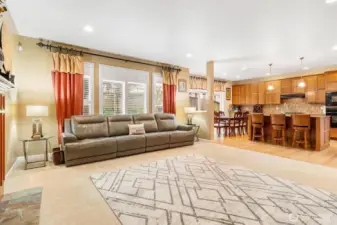 A true great room with custom wood shutters.