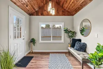 Beautiful side entry with room to have a sitting area perfect for sipping morning coffee or reading a book.
