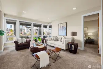 Sit back and enjoy this open and spacious Family Room Space with Views of the Lake and Pond located on the main entry level.