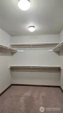 The large primary walk-in-closet offers ample space for your storage needs.