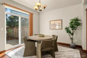 Spacious dining area with views and access to the back patio.