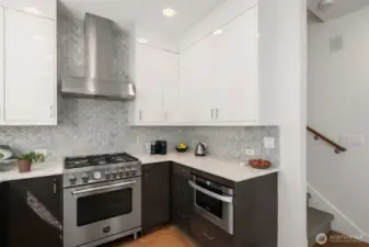 No expense was spared in construction of the townhouse as evidenced in the kitchen.  Bertazzoni dual fuel gas stove; Bosch dishwasher, Fischer Paykel French door refrigerator with ice and water, under counter Sharpe microwave await the serious cook who loves to entertain.
