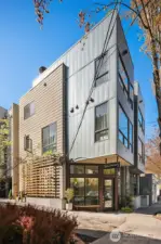 Full height of the townhouse.  First floor Commercial.  Second and Third floors are living spaces.  Top floor unseen in this photo is a rooftop terrace