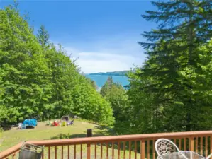Sweeping Hood Canal fjord views from the deck offer a stunning backdrop for outdoor living.