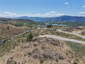 Beautiful lake views from this 5 acre lot on top of Majestic Heights
