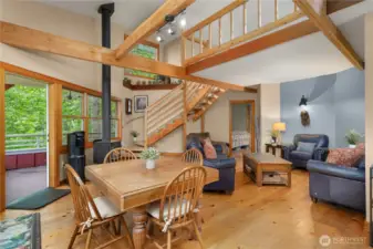 Dining room, patio, and living room view.