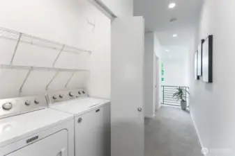 Conveniently located laundry right outside the Primary bedroom.