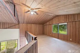 Bedroom is upstairs in the loft area.