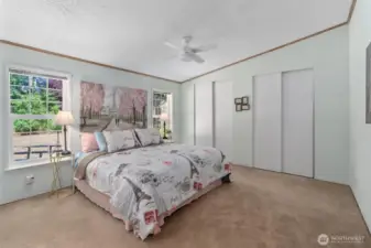 Primary bedroom with dual closets