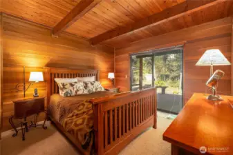 Main floor primary bedroom with access to the back deck